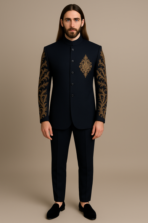 Man wearing a black suit with gold embroidery on a beige background