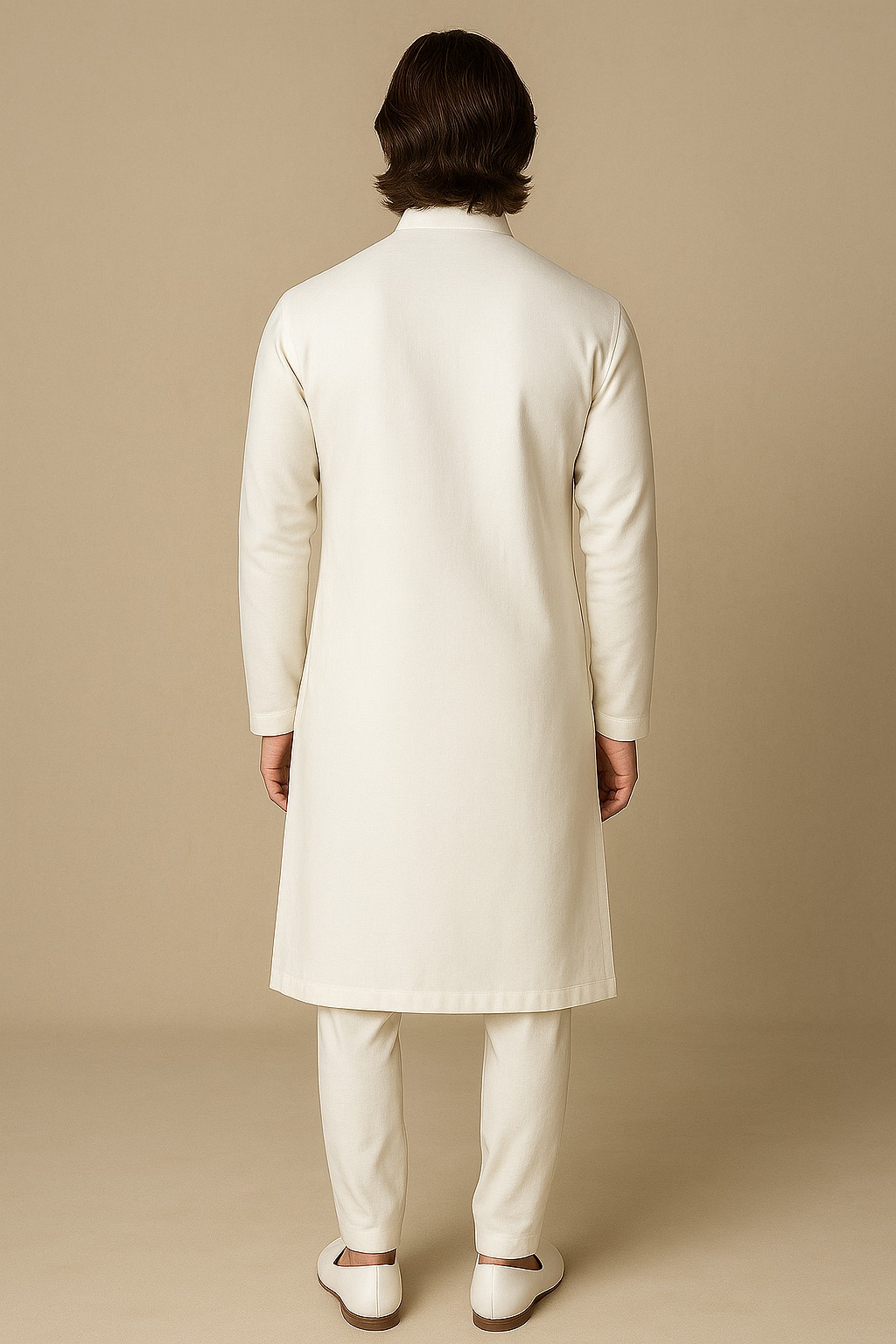 Man wearing a white traditional outfit on a beige background