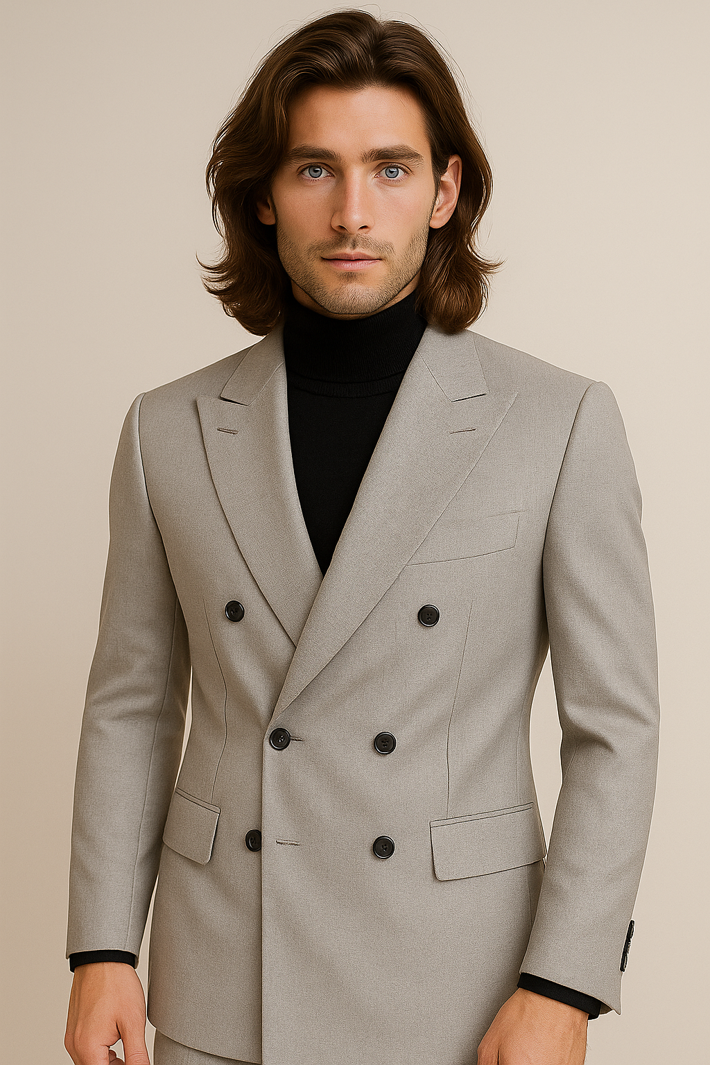 Man wearing a gray double-breasted suit jacket on a beige background
